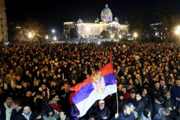 Protesters gather in front of Belgrade's city council building during a demonstration in Belgrade, Serbia, on Dec. 24, 2023. (Oliver Bunic/AFP via Getty Images)