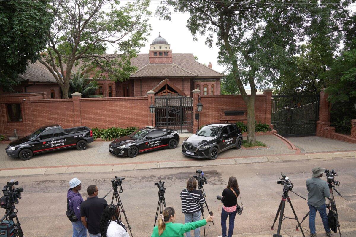 Press gather outside the home of Oscar Pistorius' uncle in the upmarket suburb of Waterkloof, Pretoria, South Africa, on Jan. 5, 2024. (Tsvangirayi Mukwazhi/AP Photo)