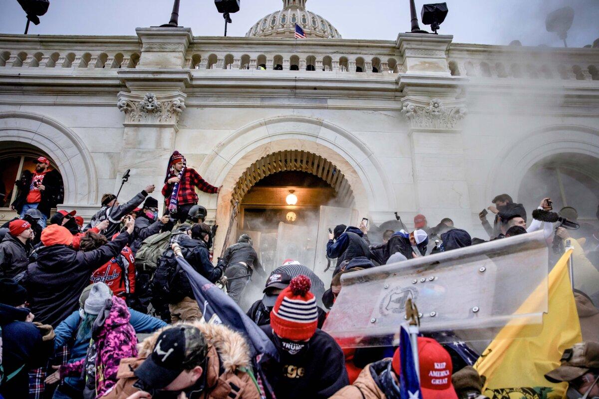 People clash with police and security forces at the U.S. Capitol in Washington, on Jan. 6, 2021. (Brent Stirton/Getty Images)
