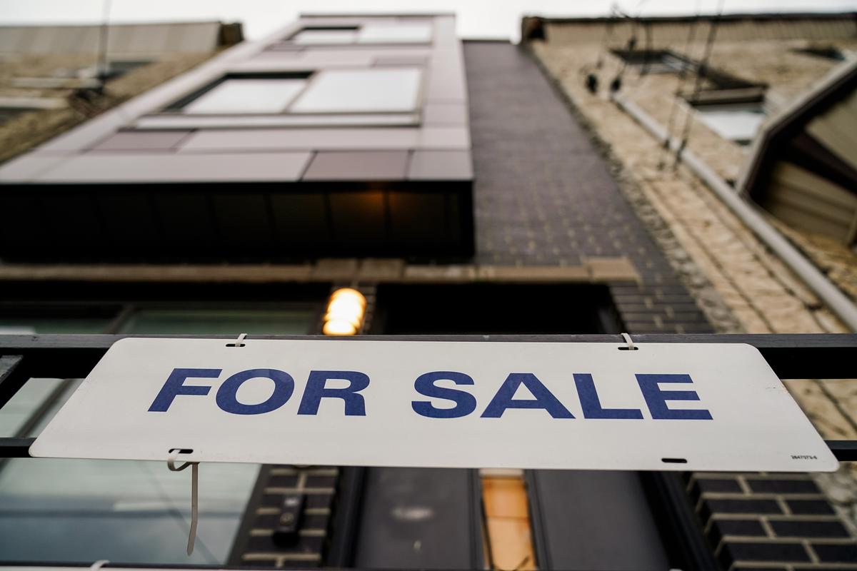 A "For Sale" sign is posted outside a single-family home in Philadelphia on Dec. 1, 2023. (Matt Rourke/AP Photo)