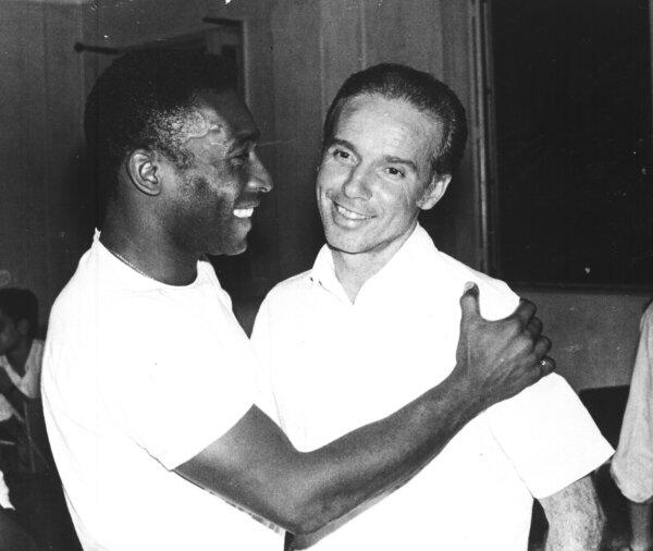 Brazil's soccer star Pele, left, embraces Mario Zagallo after the latter's appointment as coach of the Brazilian national soccer team, in Rio De Janeiro, Brazil, in March 1970. (AP Photo)