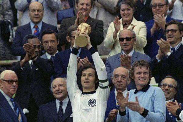 West Germany captain Franz Beckenbauer holds up the World Cup trophy after his team defeated the Netherlands by 2-1, in the World Cup soccer final at Munich's Olympic stadium, in West Germany, on Jul. 7, 1974. (AP Photo)