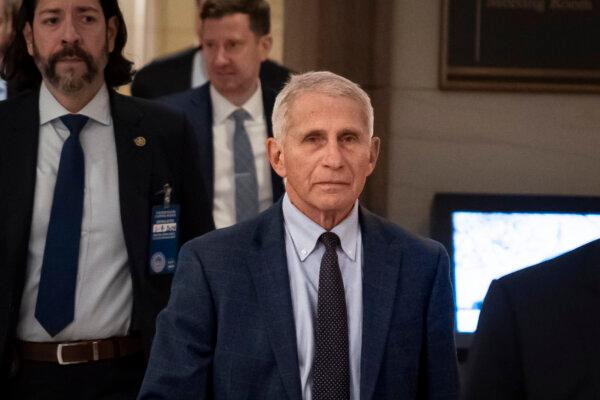 Former Director of the National Institute of Allergy and Infectious Diseases (NIAID) Anthony Fauci goes back to a meeting where he is testifying before the Select Subcommittee on the Coronavirus Pandemic in Washington on Jan. 8, 2024. (Madalina Vasiliu/The Epoch Times)