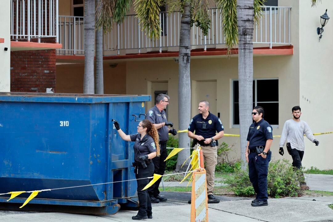 Roofers Find Baby’s Body in Trash Bin Outside South Florida Apartment Complex
