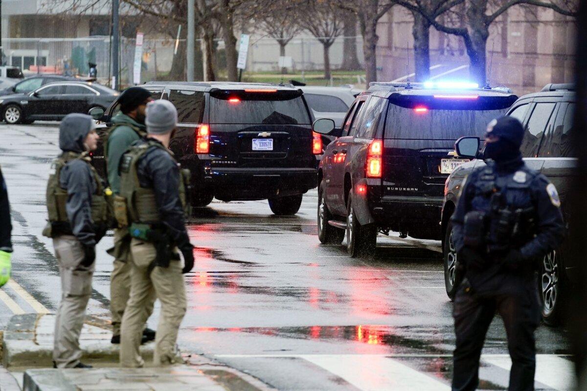 The motorcade carrying former President Donald Trump arrives at the E. Barrett Prettyman U.S. Federal Courthouse, Tuesday, Jan. 9, 2024, in Washington. (AP Photo/Jose Luis Magana)