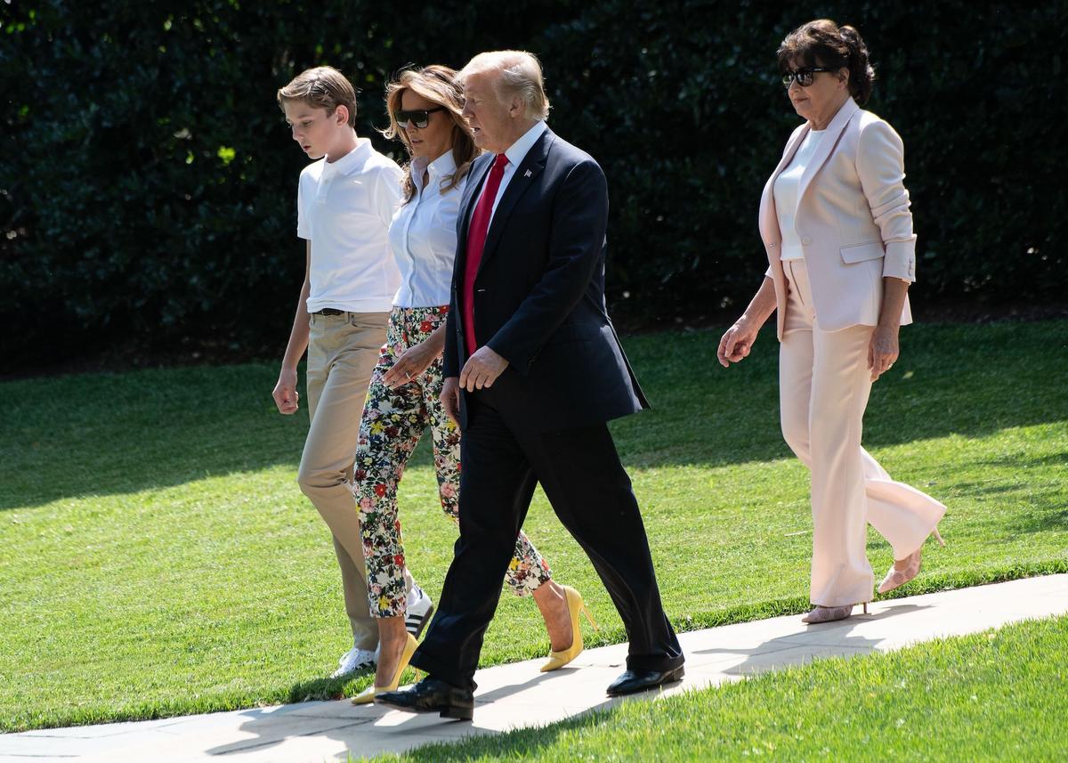 President Donald Trump (2nd L), First Lady Melania Trump (2nd R), their son Barron and Melania Trump's mother Amalija Knavs walk to board Marine One at the White House in Washington on June 29, 2018. (Nicholas Kamm/AFP via Getty Images)