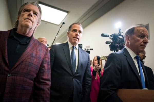 Hunter Biden, son of U.S. President Joe Biden, flanked by Kevin Morris, left, and Abbe Lowell, right, departs a House Oversight Committee meeting in Washington on Jan. 10, 2024. (Kent Nishimura/Getty Images)