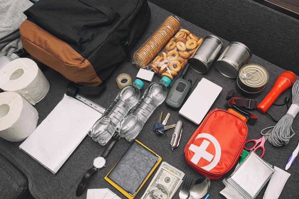 Your kit should also include high-energy snacks, light sources, and hand and foot warmers. (Skylines/Shutterstock)