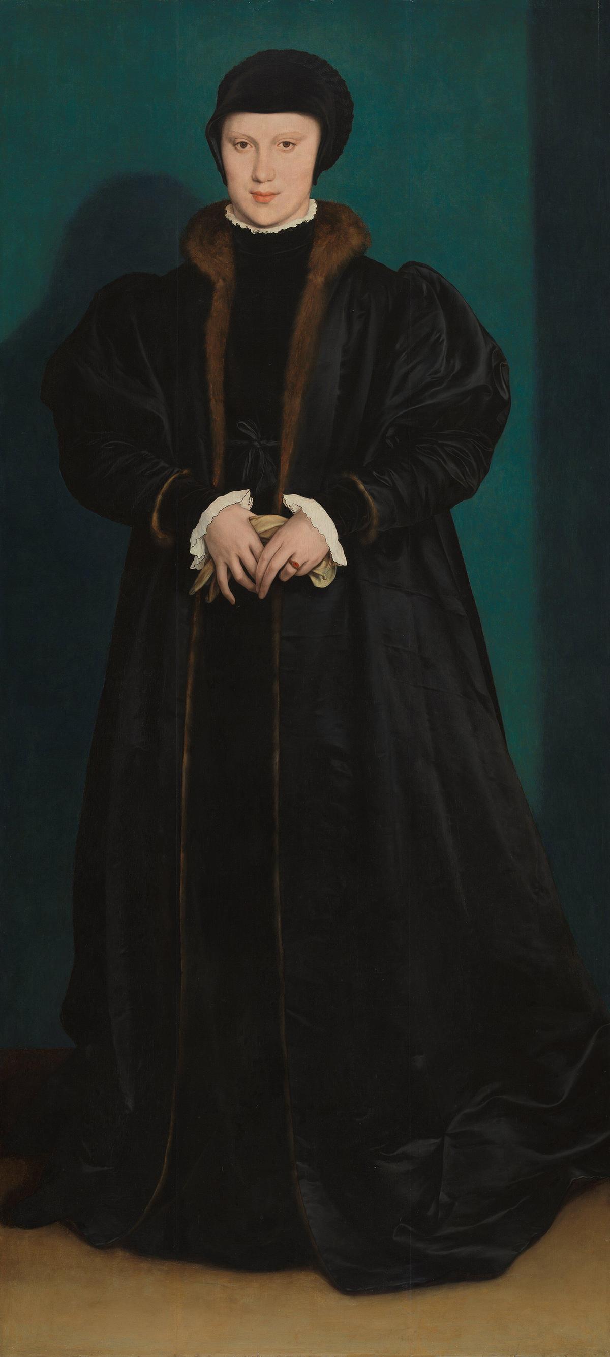 A portrait of Christina of Denmark, Duchess of Milan, 1538, by Hans Holbein the Younger. Oil on oak wood; 70 1/2 inches by 32 1/2 inches. National Gallery, London. (Public Domain)