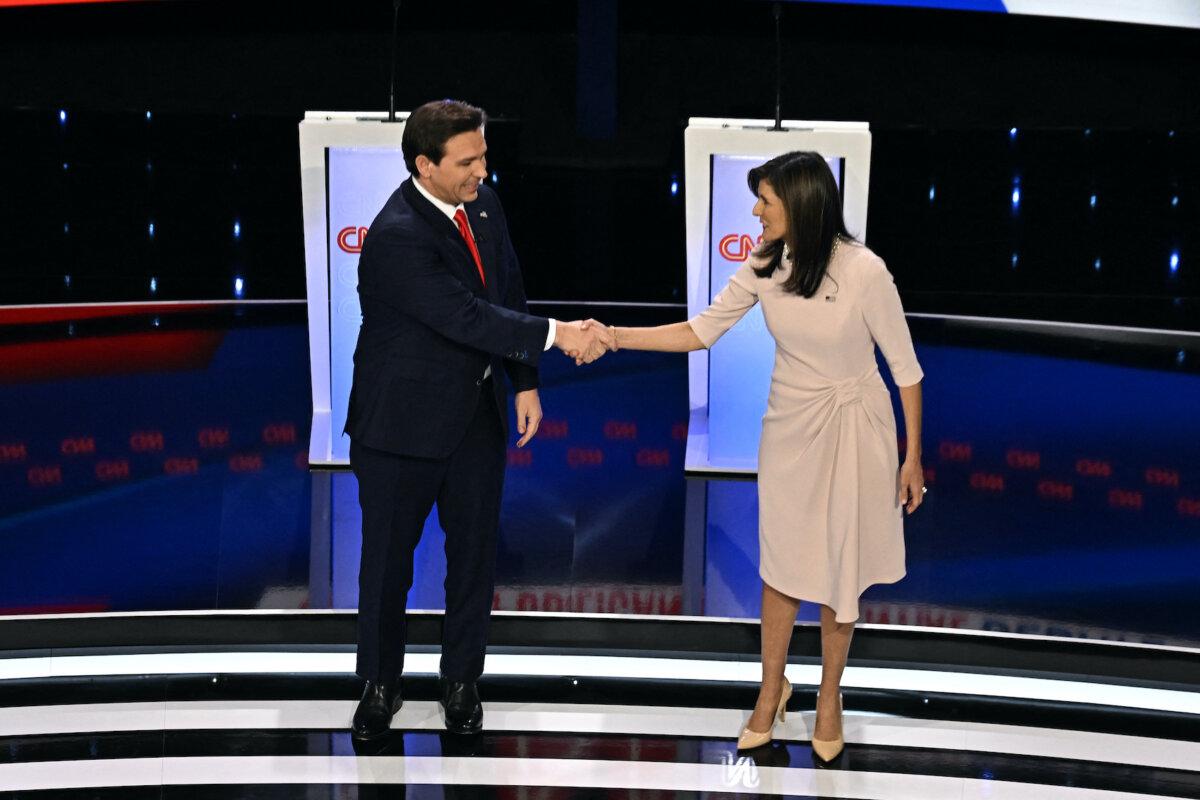 Florida Gov. Ron DeSantis shakes hands with former U.S. Ambassador to the UN Nikki Haley during the fifth Republican presidential primary debate at Drake University in Des Moines, Iowa, on Jan. 10, 2024. (Jim Watson/AFP via Getty Images)
