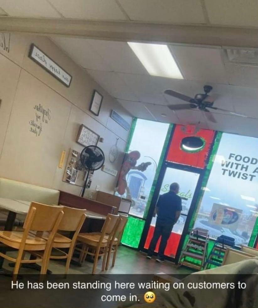 Nick Chappell snapped a photo of Mr. Hoesk looking out of the window, waiting for customers to come in. (Courtesy of Nick Chappell)