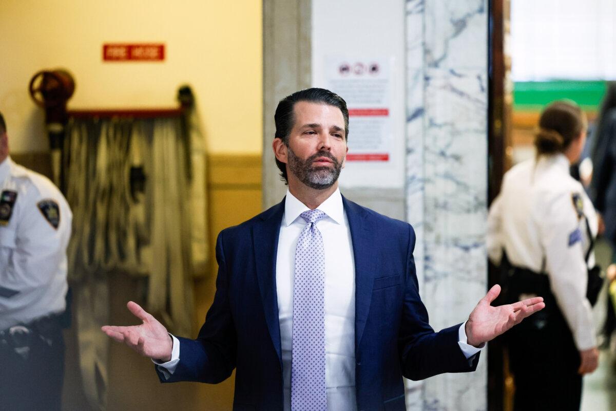 Donald Trump Jr. speaks as he leaves the courtroom after testifying in his civil fraud trial at New York State Supreme Court in New York, on Nov. 13, 2023. (Michael M. Santiago/Getty Images)