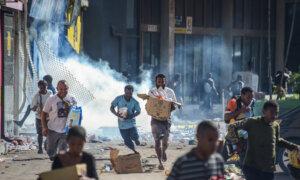 PNG Riots Sparked by Pay Dispute Claim 15 Lives