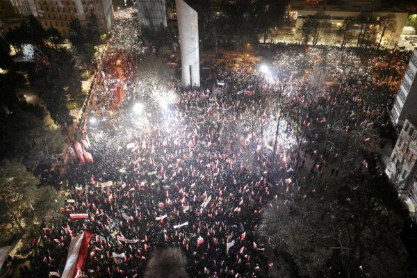 Supporters of the Law and Justice (PiS) party gather in protest against state media overhaul and arrest of former interior minister and his deputy in Warsaw, on Jan. 11, 2024. (Kuba Atys /Agencja Wyborcza.pl/via Reuters)