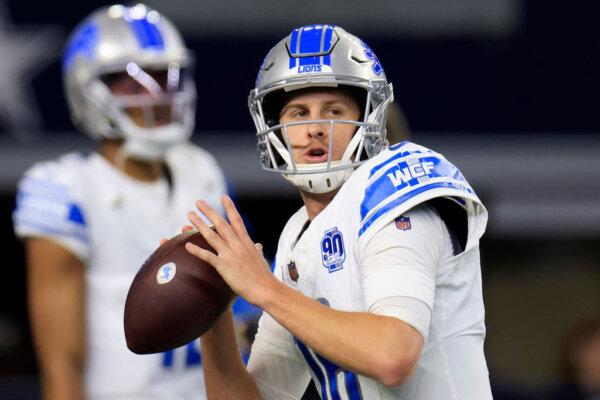 Jared Goff (16) of the Detroit Lions warms up prior to the game against the Dallas Cowboys at AT&T Stadium in Arlington, Texas, on Dec. 30, 2023. (Ron Jenkins/Getty Images)