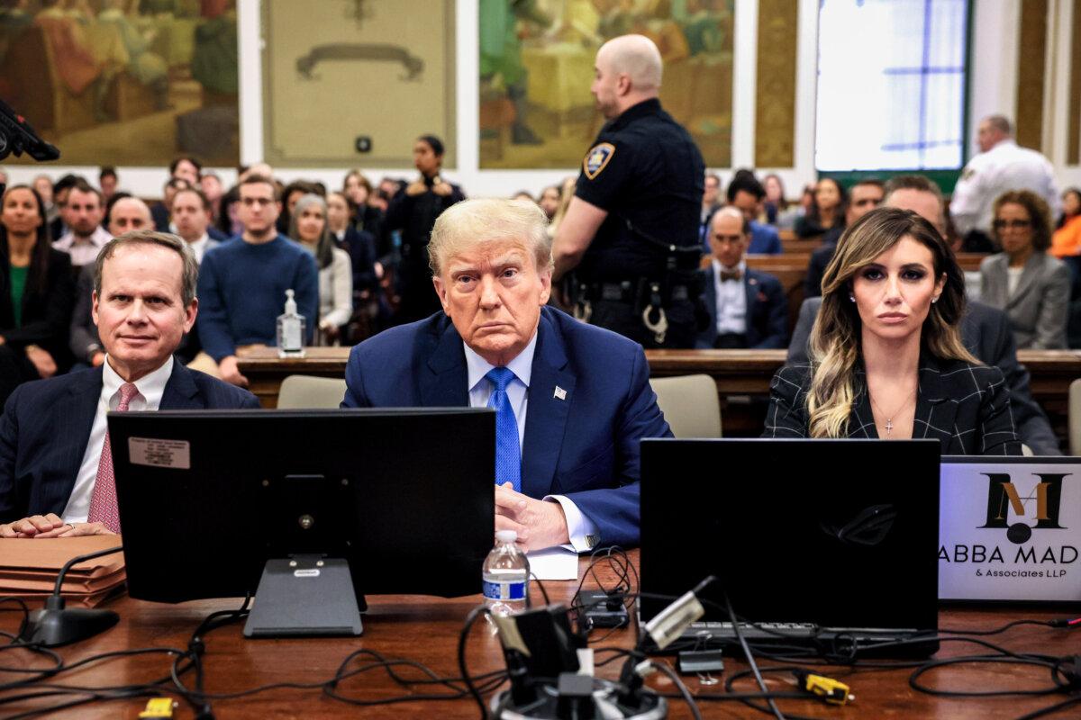 Former President Donald Trump sits in the courtroom with attorneys Christopher Kise and Alina Habba during his civil fraud trial at New York State Supreme Court in New York City on Nov. 6, 2023. (Brendan McDermid-Pool/Getty Images)