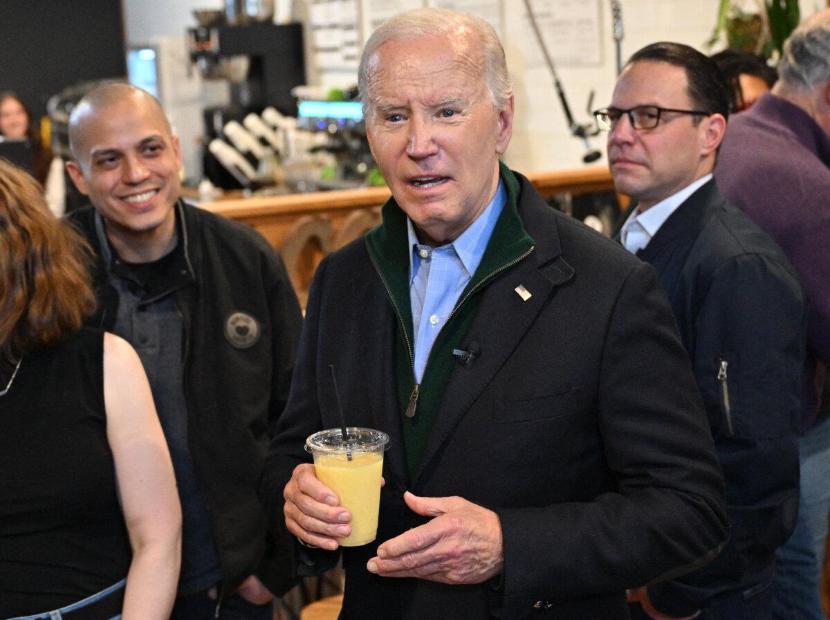 President Joe Biden speaks to reporters as he visits a coffee shop in Emmaus, Pa., on Jan. 12, 2024. (Mandel Ngan/AFP via Getty Images)