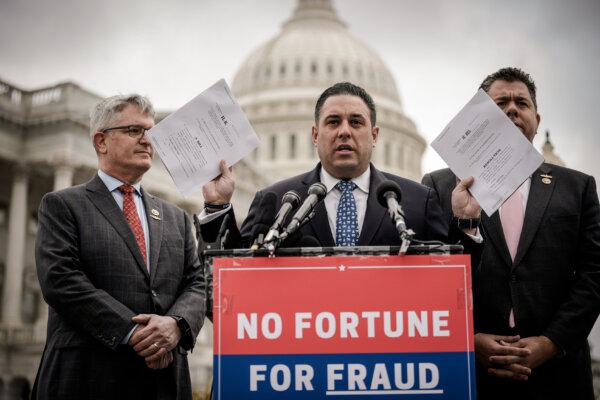 New York GOP freshmen Reps. Anthony D'Esposito holding legislation he would introduce, with Brandon Williams (L) and Nick LaLota (R), in March 2023. (Drew Angerer/Getty Images)
