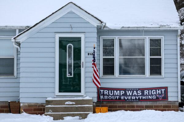 A sign supporting Republican presidential candidate former President Donald Trump is displayed on a house on Jan. 11, 2024, in Ogden, Iowa. (Kevin Dietsch/Getty Images)
