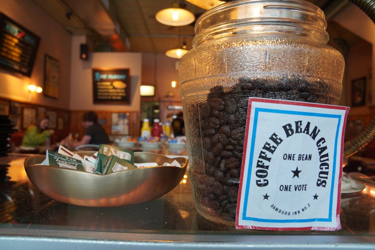 Signage and beans at the Coffee Bean Caucus, a tradition at the Hamburg Inn No. 2 in Iowa City, Iowa, on Jan. 13, 2024. (Nathan Worcester/The Epoch Times)