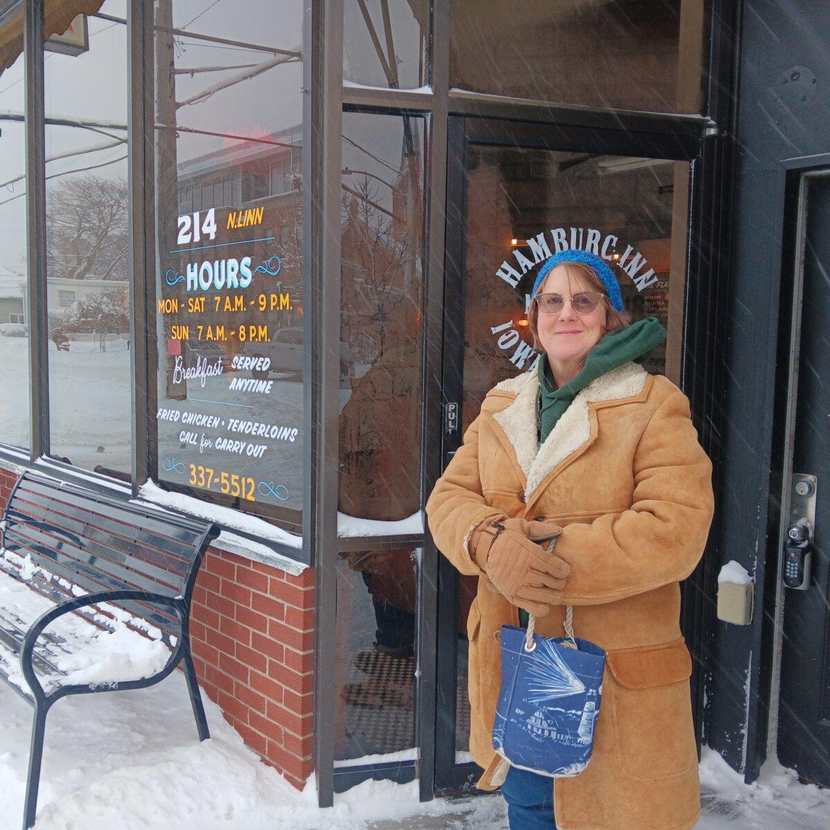 Renee Speh stands outside the Hamburg Inn No. 3 in Iowa City, Iowa, on Jan. 13, 2024. (Nathan Worcester/The Epoch Times)