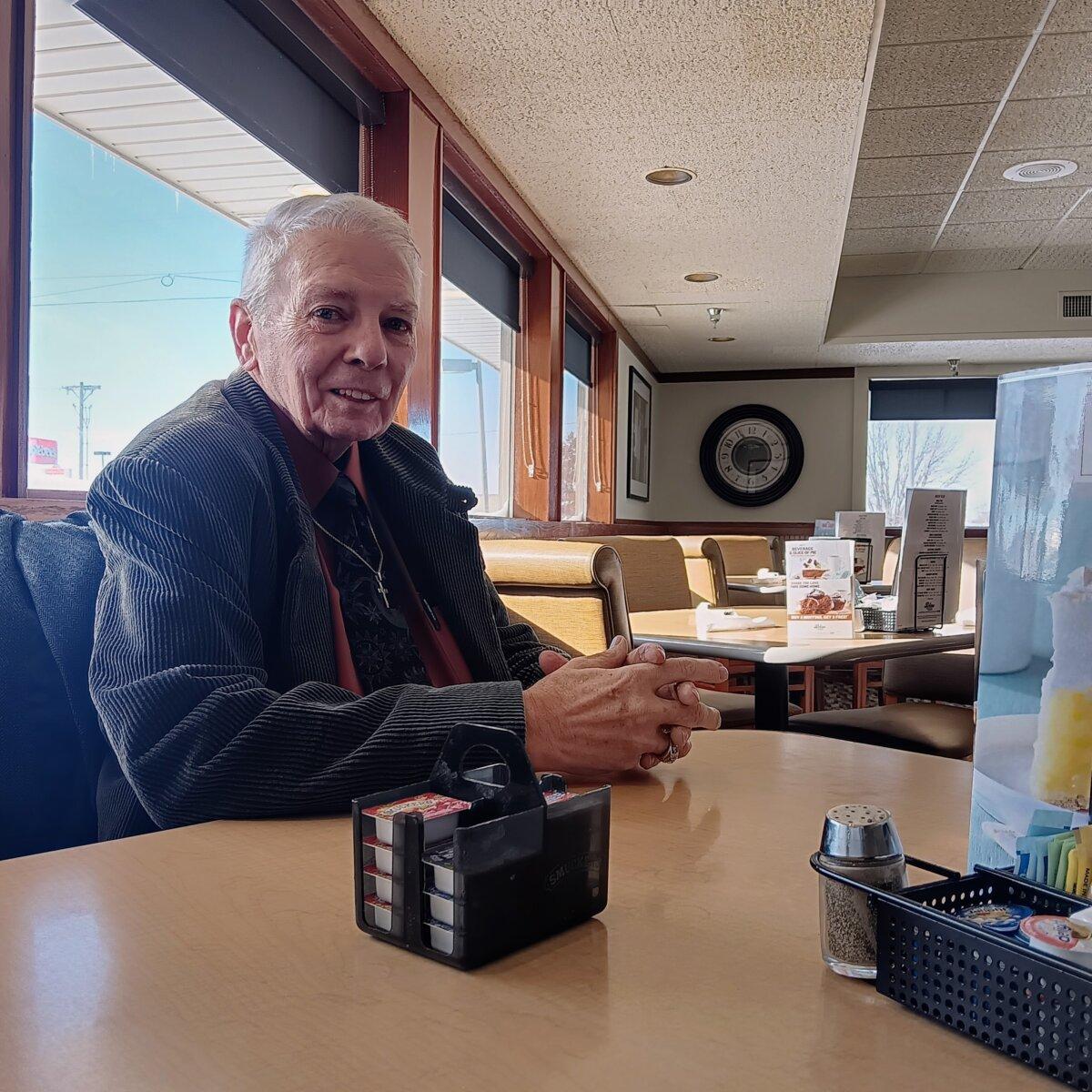 Ray Mitchum, a retired high school biology teacher, at a Perkins diner in Marshalltown, Iowa, on Jan. 14, 2024, just one day ahead of his state's caucus. "Iowa is in a position that is special." (Nathan Worcester/The Epoch TImes).