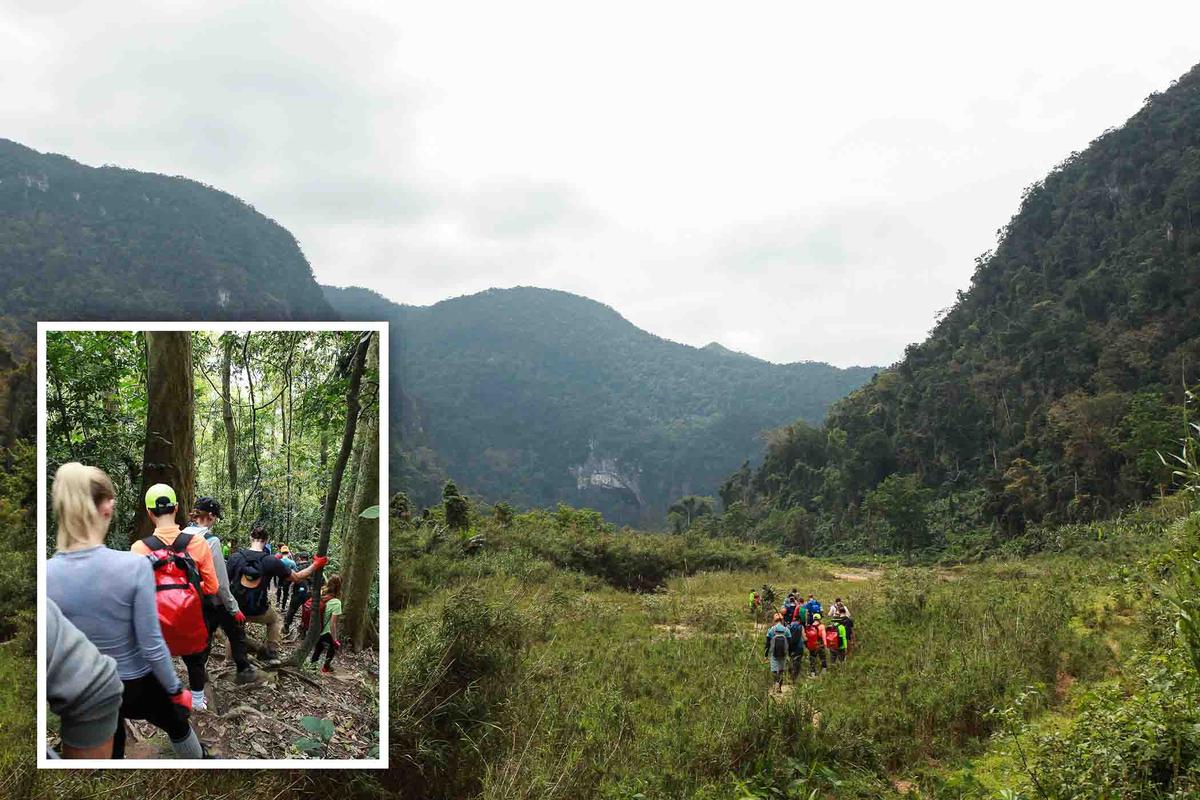 A party of explorers make their way through the valley in Quang Binh Province (Pham Mai Han/Shutterstock)