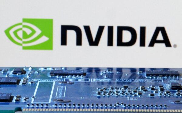 NVIDIA logo near computer motherboard, on Jan. 8, 2024. (Dado Ruvic/Illustration/Reuters)