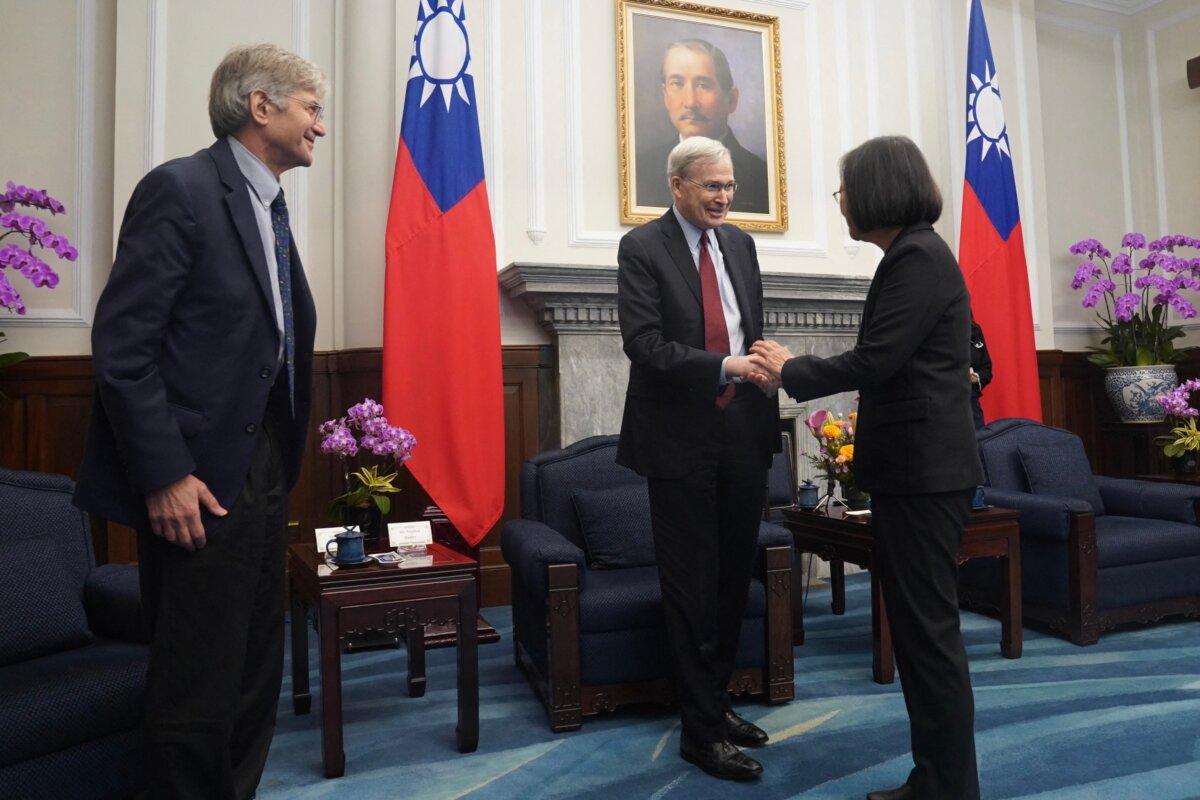 Taiwanese President Tsai Ing-wen shakes hands with former U.S. national security adviser Stephen Hadley and former U.S. Deputy Secretary of State James Steinberg during a visit to the Presidential Office in Taipei, Taiwan, on Jan. 15, 2024. (CNA Pool/AFP via Getty Images)