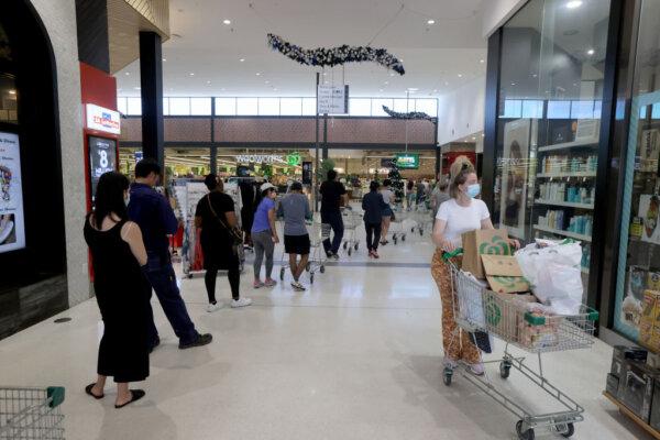 People queuing at Woolworths at West Torrens in Adelaide, Australia, on Nov. 18, 2020. (Kelly Barnes/Getty Images)