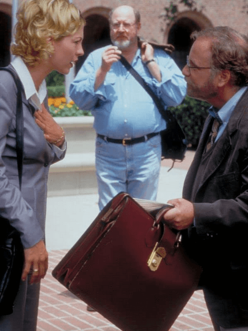 Veronica (Jenna Elfman) and James Krippendorf (Richard Dreyfuss) (foreground), in "Krippendorf's Tribe." (Touchstone Pictures)