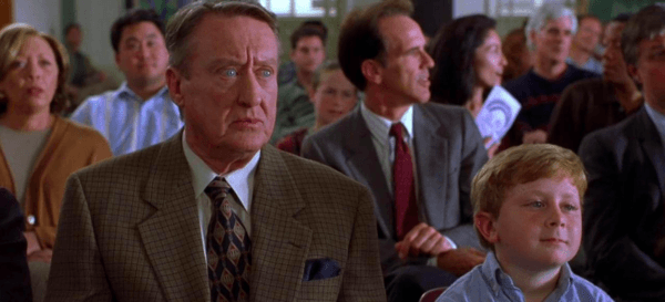 A shocked school parent (Tom Poston) and Edmund Krippendorf (Carl Michael Lindner, foreground) at Mike's show-and-tell, in "Krippendorf's Tribe." (Touchstone Pictures)