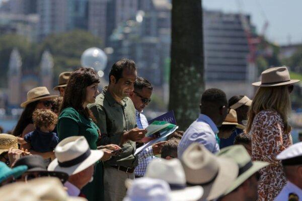 New citizens take a pledge at Citizenship Ceremony on Australia Day in Sydney, Australia, on Jan. 26, 2023. (Roni Bintang/Getty Images)