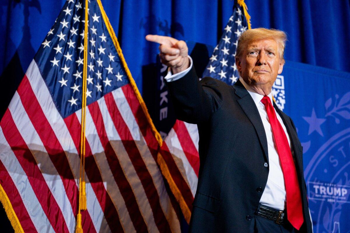 Republican presidential candidate former President Donald Trump points to supporters at the conclusion of a campaign rally at the Atkinson Country Club in Atkinson, N.H., on Jan. 16, 2024. (Brandon Bell/Getty Images)