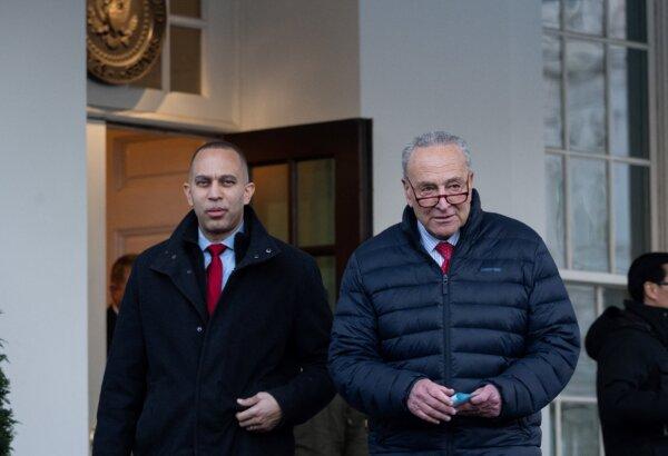Senate Majority Leader Chuck Schumer (D-N.Y.) and House Democratic Leader Hakeem Jefferies (D-N.Y.) arrive to speak to reporters following a meeting with President Joe Biden about government funding, outside the West Wing of the White House on Jan. 17, 2024. (Saul Loeb/AFP via Getty Images)