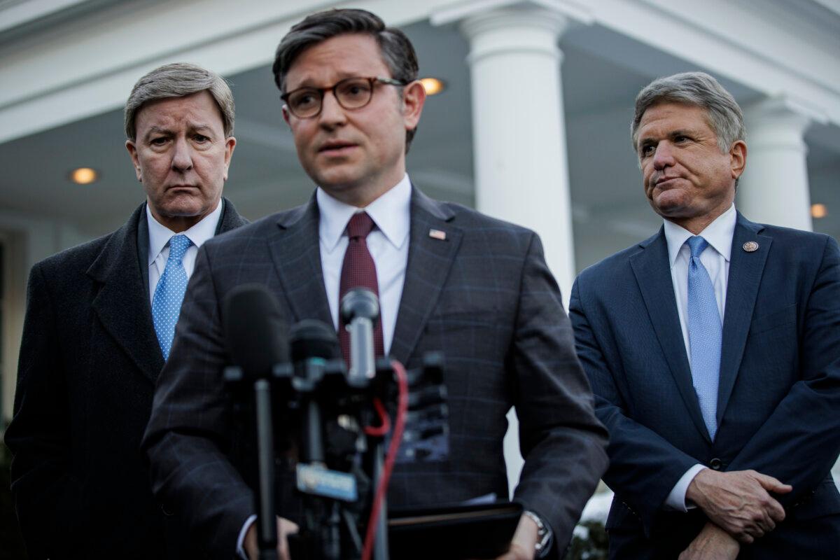 (L-R) Reps. Mike Rogers (R-Ala.) and Mike McCaul (R-Texas) stand behind Speaker of the House Mike Johnson (R-La.) as he makes a statement outside the West Wing of the White House on Jan. 17, 2024. (Samuel Corum/Getty Images)