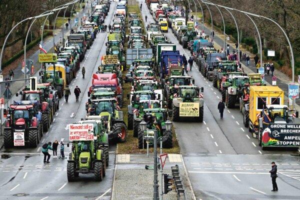 Tractors and trucks stand in a street during a farmer protest in Berlin on Jan. 15, 2024.<br/>(John MacDougall/AFP via Getty Images)