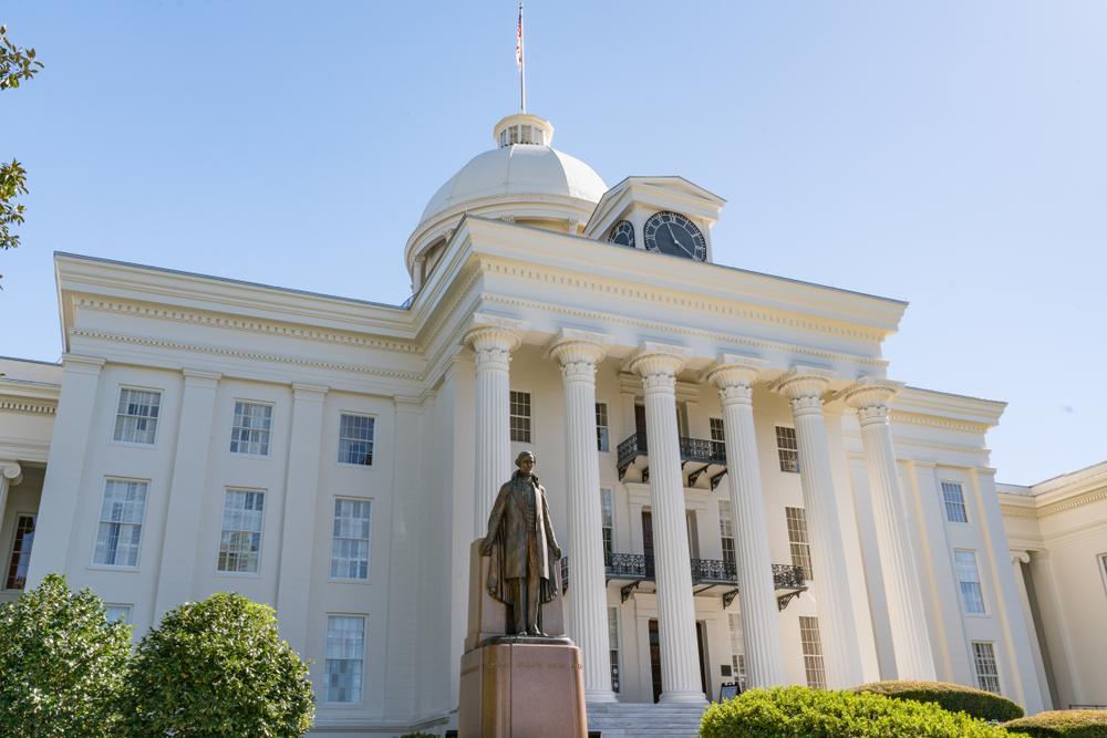 The Alabama State Capitol Building with a statue of Jefferson Davis in the foreground, in Montgomery, Ala. on Oct. 30, 2017. (Paul Brady Photography/Shutterstock)