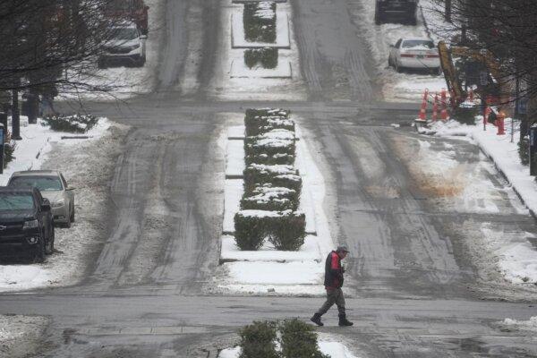 A person crosses Deadrick St., in Nashville, Tenn., on Jan. 18, 2024. (George Walker IV/AP Photo)