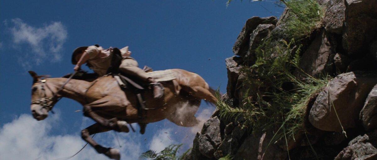Jim Craig (Tom Burlinson) takes a big leap, in "The Man From Snowy River." (20th Century Fox)