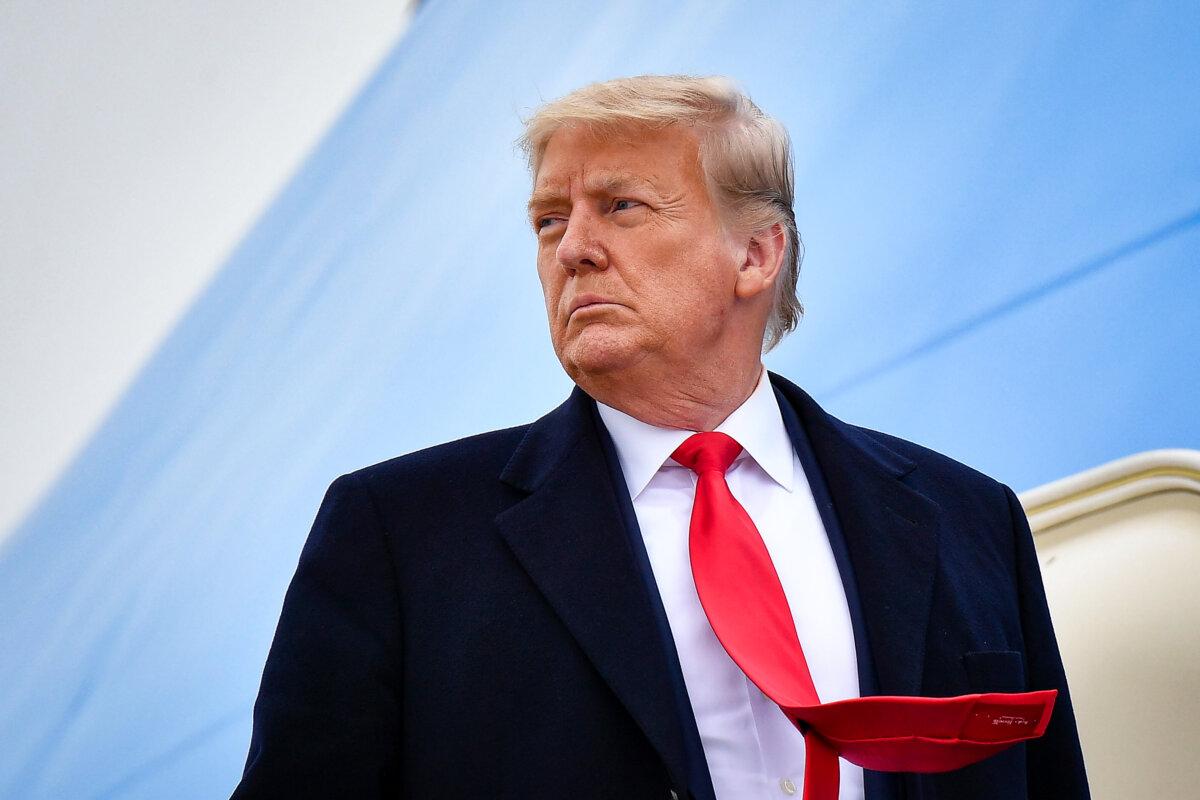 President Donald Trump boards Air Force One before departing Harlingen, Texas, on Jan. 12, 2021. (Mandel Ngan/AFP via Getty Images)