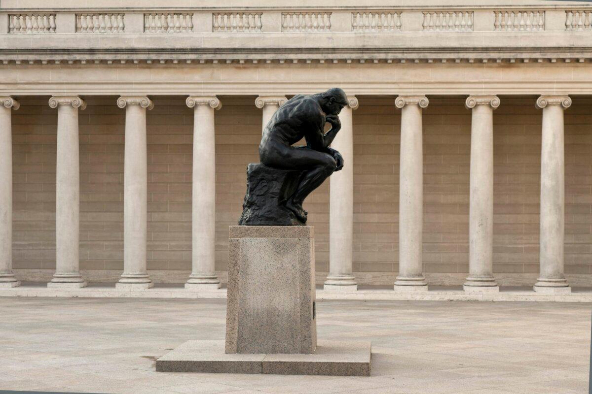 Located in the Court of Honor at the museum's entrance is a bronze casting of Auguste Rodin’s "The Thinker." Note the columns and walls in the background. The Legion was a three-quarter scale adaption of the 18th-century Parisian original and incorporated the most advanced ideas in museum construction. The walls were 21 inches thick and made with hollow tiles to keep the temperature even. (Courtesy of the Legion of Honor)