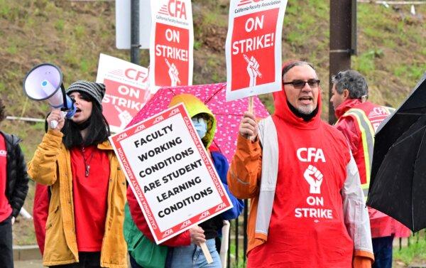 Faculty members and other employees at California State University Los Angeles stop working for the start of a five-day strike at Cal State LA in Los Angeles on Jan. 22, 2024. (Frederic J. Brown/AFP via Getty Images)