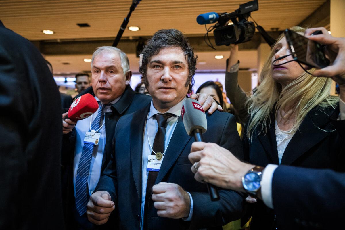 Argentina's President Javier Milei is surrounded by media after delivering a speech at the World Economic Forum meeting in Davos on Jan. 17, 2024. (Fabrice Coffrini/AFP via Getty Images)
