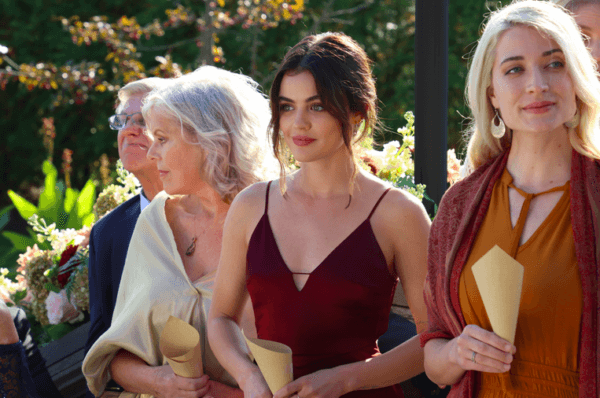 Jane (Lucy Hale, center, in red) attends a friend's wedding, in "Which Brings Me to You." (Decal Releasing)
