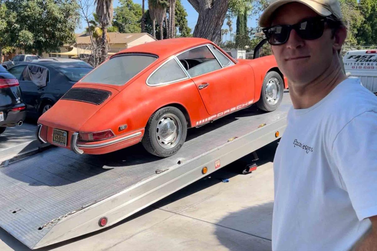On the day of its purchase, Mr. Gideon poses with his new Porsche 912 on a tow truck. (Courtesy of <a href="https://www.instagram.com/mgideon_/">Michael Gideon</a>)