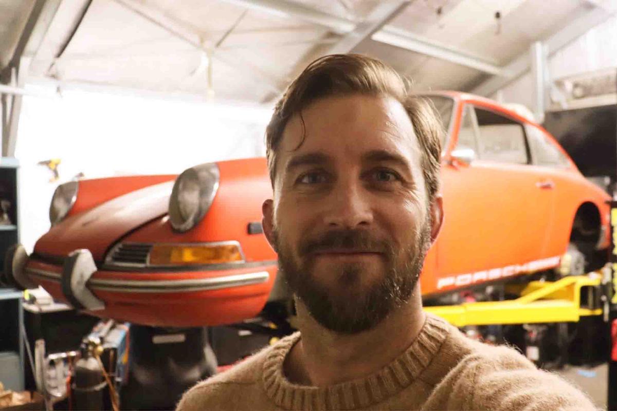 Mr. Gideon poses before his Porsche 912 on a lift. (Courtesy of <a href="https://www.instagram.com/mgideon_/">Michael Gideon</a>)
