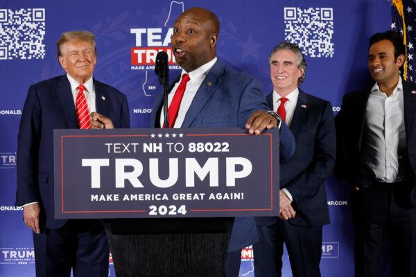 Sen. Tim Scott (R-SC) (2nd-R) speaks as Republican presidential candidate and former President Donald Trump (L), North Dakota Gov. Doug Burgum (2nd-R) and Vivek Ramaswamy (R) listen during a campaign rally in the basement ballroom of The Margate Resort on Jan. 22, 2024 in Laconia, New Hampshire. (Chip Somodevilla/Getty Images)