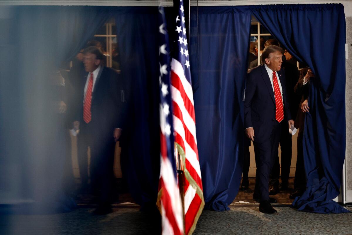 Republican presidential candidate and former President Donald Trump arrives for a campaign rally in the basement ballroom of The Margate Resort on Jan. 22, 2024 in Laconia, New Hampshire. (Chip Somodevilla/Getty Images)