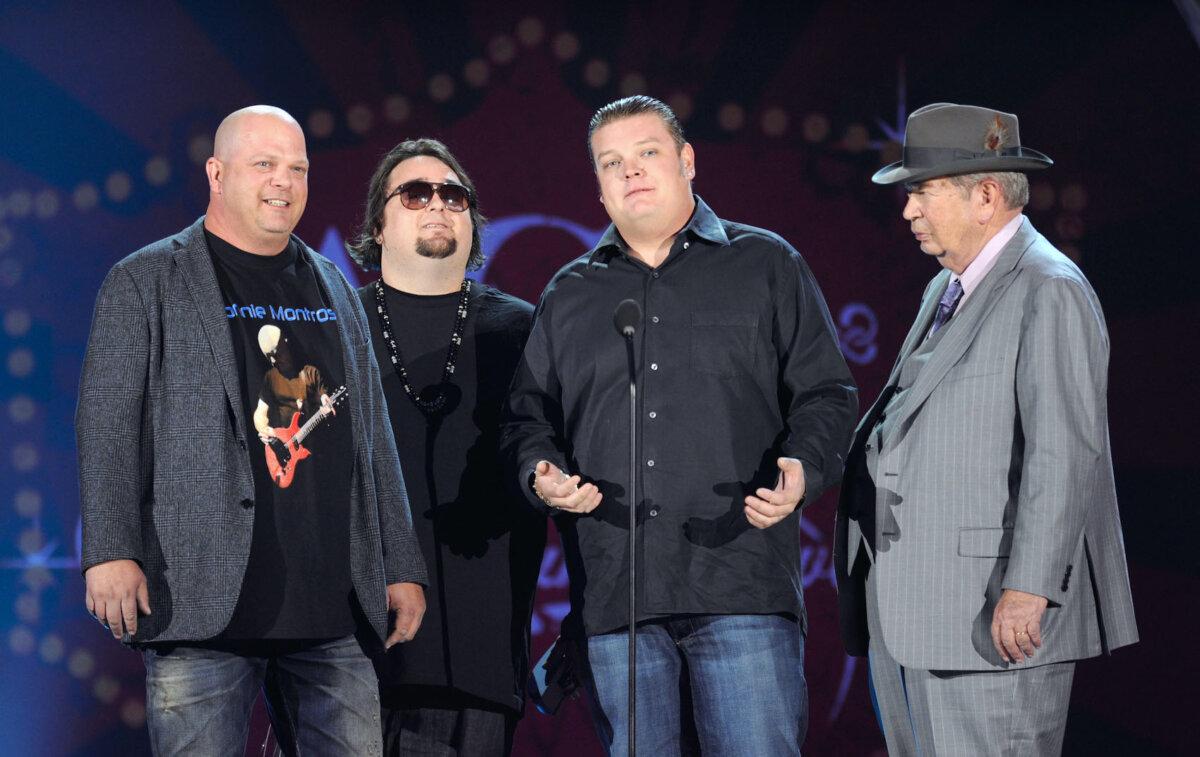 (L-R) TV Personalities Rick Harrison, Austin 'Chumlee' Russell, Corey Harrison and Richard Harrison of 'Pawn Stars' speak onstage at the American Country Awards 2011 at the MGM Grand Garden Arena in Las Vegas on Dec. 5, 2011. (Ethan Miller/Getty Images)